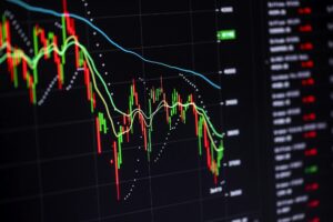 Stock charts on the monitor close up. Finance and stock exchange concept